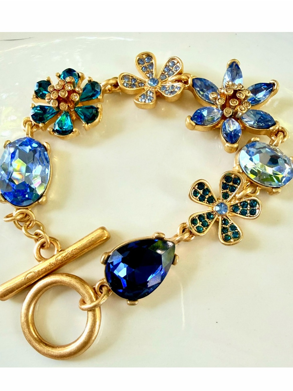 Oscar de la Renta Gold-Tone Bracelet with Blue and Teal Floral Crystals - Picture 6 of 9